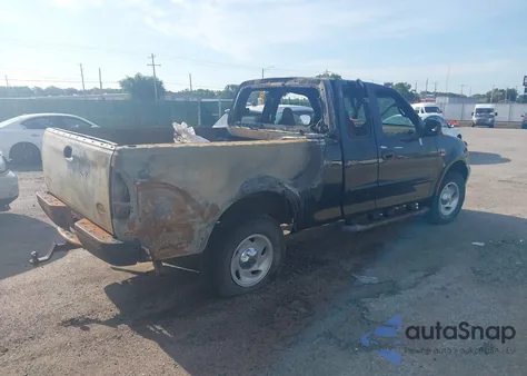 1999 Ford F-150 из США, поврежденный, VIN 1FTRX18WXXNB00041